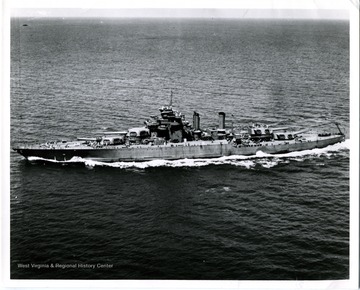 An aerial view of U.S.S. West Virginia (BB-48), board on beam.