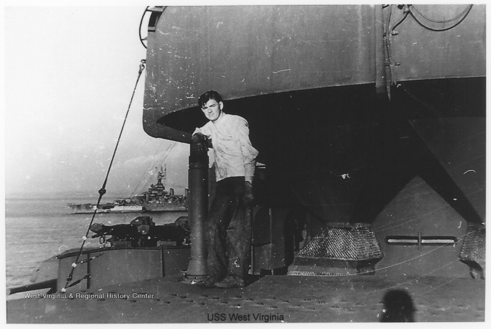 Photos are from an album belonging to a crew member of the U.S.S. West Virginia.  William Wright, Radio Technician 2C, was on the ship from 1944-45 and saw action at Leyte Gulf, Iwo Jima, and Okinawa. Another battleship is visible in the background.  