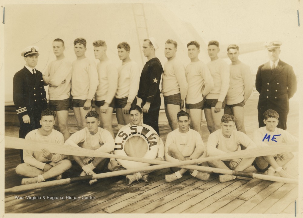 Whale boat crew that won a race near San Pedro, California, on February 4, 1934 with a time of 16 minutes, 7 seconds.  William Hand is identified as front row, far right.